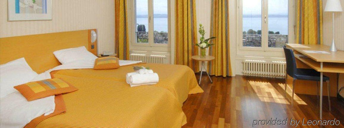 Hotel Alpes & Lac Neuchâtel Oda fotoğraf